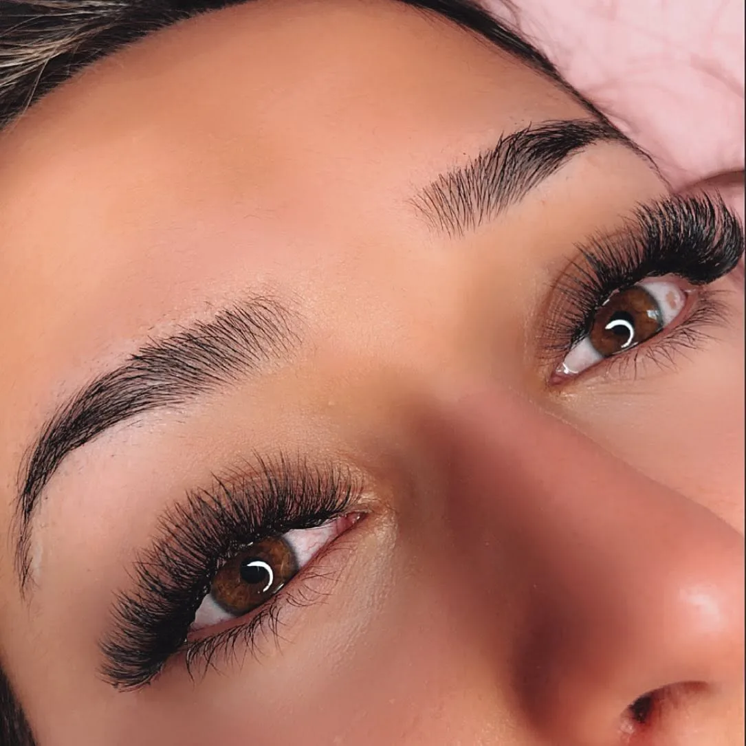Even volume lash set on two brown eyes